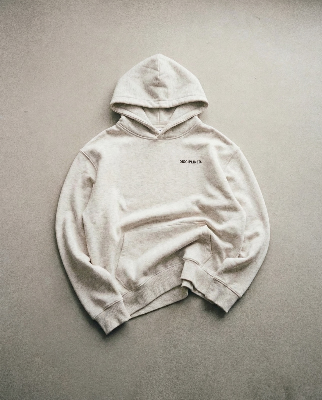 DISCIPLINED. fleece hoodie — studio still